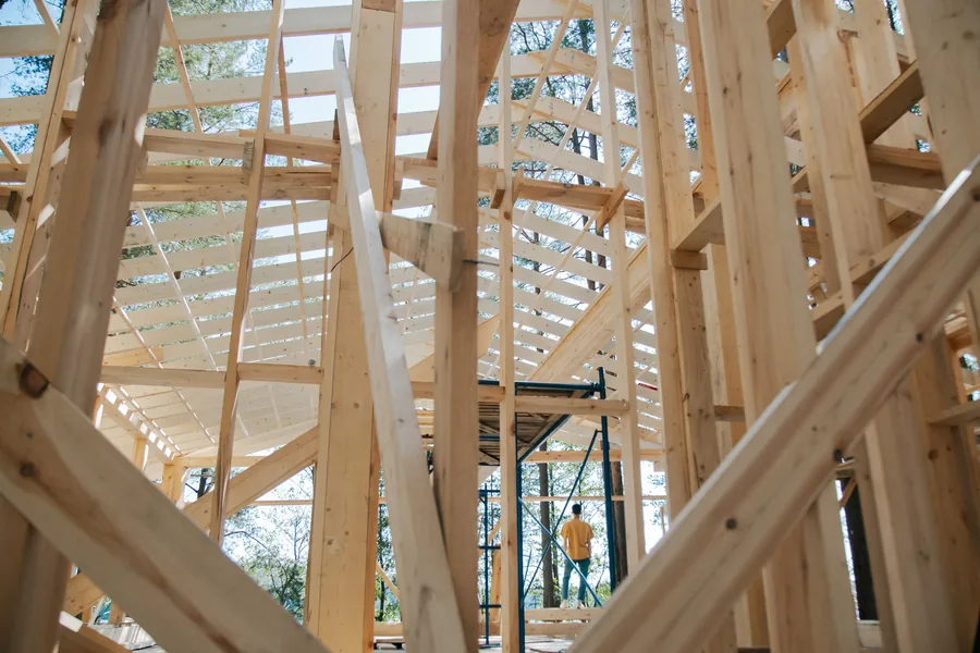 Timber framing inside a house under construction.